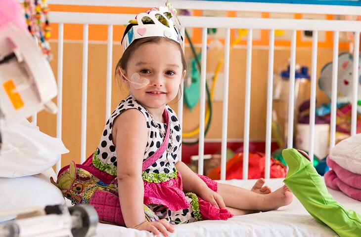 girl patient smiling in pediatric hospital